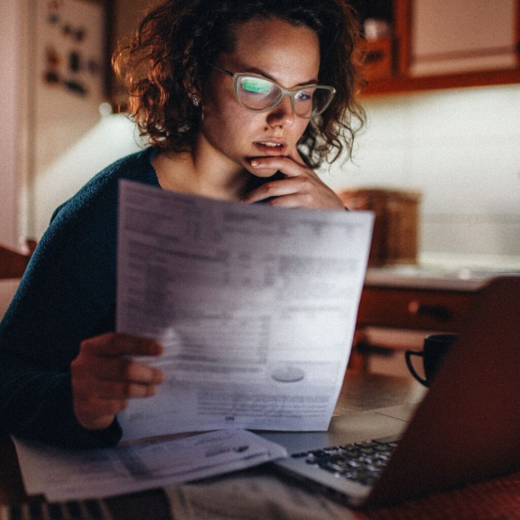 women looking at paperwork